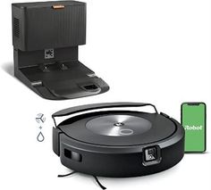 a robot vacuum is shown next to an electronic device