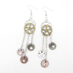 CosplayThese fabulous Jewelry Vintage Gears Earrings Steampunk will dazzle and add style to your ensemble. They are full of personality and make the perfect statement piece for any occasion. Whether you purchase them for yourself, as a gift, or for your special someone, these exquisite earrings will be sure to please. The steampunk design is stylish, industrial and vintage and will make a unique addition to your look. A perfect mix of Goth and Victorian, these trendy earrings will make a great g Kinetic Earrings, Street Jewelry, Gear Earrings, Industrial Gears, Steampunk Earrings, Cheap Earrings, Steampunk Design, Trendy Earrings, Fabulous Jewelry