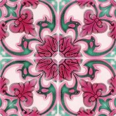 a pink and green tile design with flowers on it's center, surrounded by smaller tiles