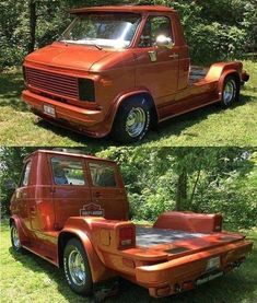 an orange truck parked in the grass next to trees