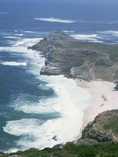 an aerial view of the ocean and coastline