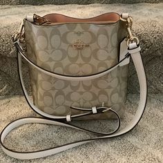 Coach Mollie Bag 22 In Signature Canvas Center Zip Compartment Snap Closure Brand New! Luxury Cream Crossbody Bucket Bag, Luxury White Pouch Bucket Bag, Luxury White Pouch-style Bucket Bag, Luxury White Bucket Bag, Designer Cream Bucket Bag With Detachable Handle, Designer White Bag With Adjustable Strap, Luxury White Evening Bucket Bag, Cream Bucket Satchel With Detachable Strap, Designer White Pouch Bucket Bag