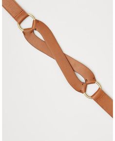 a tan leather belt with gold buckles on the side and an open loop at the end