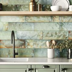 the kitchen counter is clean and ready to be used as a backsplash for cooking utensils