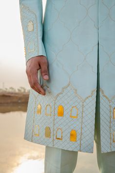 By Runit Gupta Designer Embroidered Fitted Sherwani, Unstitched Art Silk Sherwani With Cutdana Detailing, Embroidered Semi-stitched Art Silk Sherwani, Semi-stitched Sherwani With Intricate Embroidery, Embroidered Semi-stitched Sherwani, Nav Durga, Blue Sherwani, Fashion Models Men