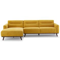 a yellow sectional sofa sitting on top of a white floor next to a wooden frame