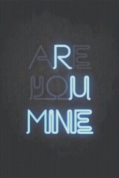 a neon sign that says are you mine? in blue and white on a black background