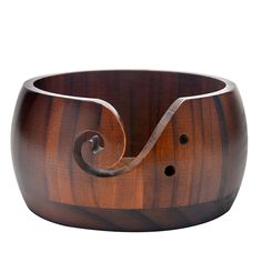 a wooden bowl with metal handles on an isolated white background in the shape of a spiral