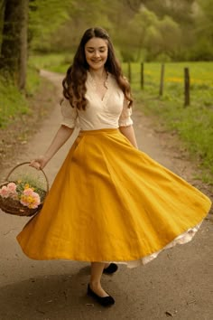 A new Knightley skirt is joining Shirinatra Limited Spring Collection, inspired by classic books. Made from 100% linen, this versatile marigold skirt can be paired with a Bonnet blouse or with different tops of your choice. Enrich your summer wardrobe with this limited-edition gem. DRESS DESIGN FEATURES: * ¾ circle skirt * Side seam pockets * Below the knee length * White interior lining on the bottom * Side buttons and stretch waist on the back MATERIAL & CARE ✔Made from 100% linen, pre-washed Fall Season Full Skirt, Yellow Skirt Outfit, Fantasy Skirt, Korean Style Skirt, Gem Dress, Yellow Cottagecore, Yellow Outfits, Victorian Skirt, Academia Style