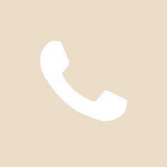 an image of a white phone on a beige background