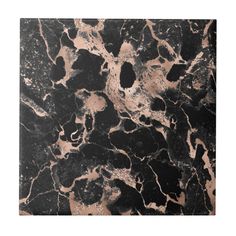 a black and brown marble textured wallpaper with an abstract design in the middle