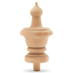 a wooden chess piece on a white background