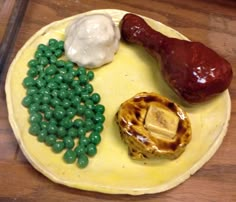 a yellow plate topped with different types of food