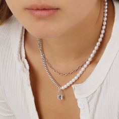 Get the best of both worlds with this unique half and half style of a gold filled cuban chain or rhodium over silver chain and genuine freshwater pearls. This special piece will surely lock itself in your heart with the edginess gold chains offset by the simplicity of a link of pearls. Trendy Pearl Necklace Chain Gift, Trendy Silver Jewelry With Pearl Charm, Trendy Pearl Necklace As A Gift, Trendy Pearl Necklace With Chain For Gift, Trendy Pearl Necklace For Gift, Trendy Pearl Chain Link Jewelry, Silver Pearl Necklace With Double Chain, White Double Chain Necklace Gift, White Pearl Necklace With Double Chain