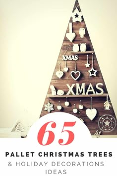 a wooden christmas tree with the words 65 pallet christmas trees and holiday decorations