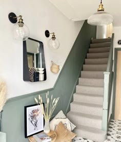 the stairs are painted in shades of green and white