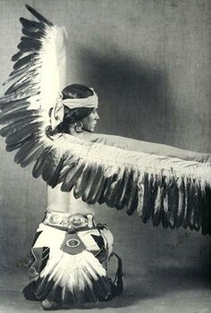 an old black and white photo of a native american woman