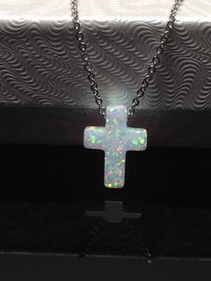 925 Sterling Siler White Opal Cross Pendant Necklace - Metal: 925 Sterling Silver (Finish: Rhodium Plated) - Stone: Simulated/Synthetic White Fire Opal - Shape: Cross   - Pendant Dimension: 12mm(0.47 in) x 9mm(0.35 in) x 2.5mm, Thickness 2.8mm - Light Cable Chain: 17.75" Adjustable (15.75" + 1" + 1"), Spring Ring Clasp - Color: Silver Sterling Silver Cross Necklace, Cross Pendant Necklace, Metal Necklaces, White Opal, Fashion Jewelry Necklaces, Necklace Gift, Charm Necklaces, Sterling Silver Pendant, Spring Rings