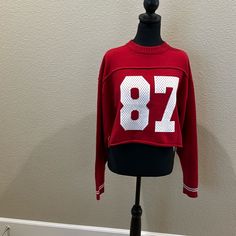 Nwt Crop Sweatshirt Rayon And Nylon Incredibly Soft And Comfy Oversized Medium Pit To Pit 22” Red Tops For Game Day In Fall, Oversized Red Collegiate Top, Red Oversized Sporty Sweater, University Red Tops For Fall, Trendy Game Day Winter Tops, Trendy Winter Game Day Tops, Trendy Winter Tops For Game Day, Red Sporty Tops For College, Oversized Red Sporty Top