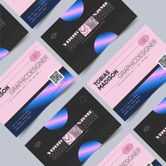 six business cards designed to look like they are made out of pink and blue paper