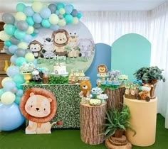 an animal themed birthday party with balloons and decorations