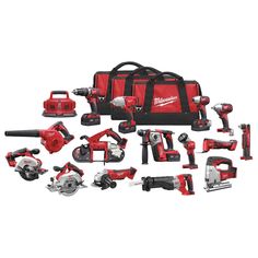 the milwaukee power tools set is shown in red and black, including two cordless drillers