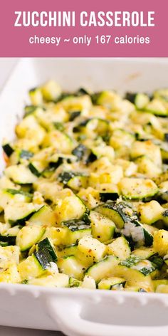 zucchini casserole with cheese and other vegetables in a white baking dish