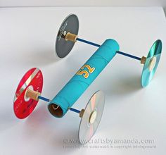 an image of a toy with wheels on the back and one wheel attached to it