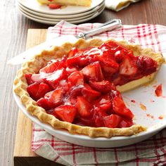 a strawberry cream cheese pie on a white plate