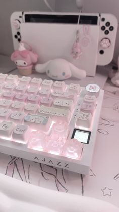 a pink keyboard sitting on top of a table