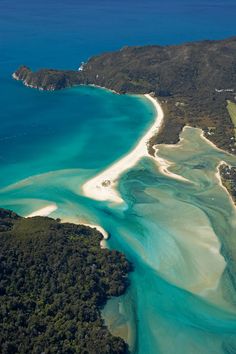 an aerial view of the blue water and white sand beach in new zealand's north island