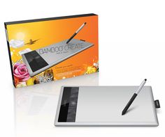 a tablet with a pen in front of it and an open box for the new ipad