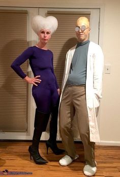 a man and woman dressed up in costumes