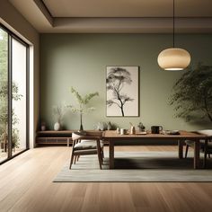 a dining room with wooden floors and green walls, along with a large painting on the wall