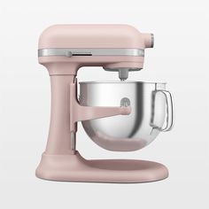 an image of a pink mixer on a white background