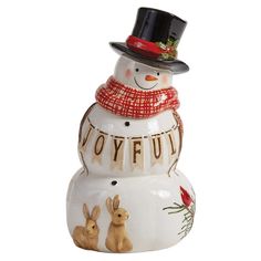 a ceramic snowman with a hat and scarf