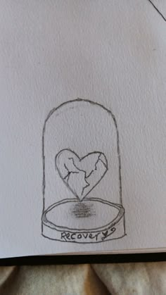 a drawing of a heart in a glass jar with the words recovery written on it