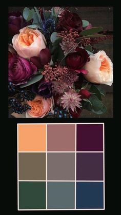 a bouquet of flowers sitting on top of a wooden table next to a color palette