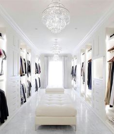 a white room with lots of closet space