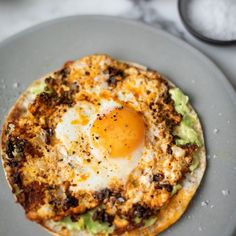 Eggs fried in feta and chilli crisp oil (viral recipe) - Drizzle and Dip Chili Oil And Feta Fried Egg, Arugala Recipes Breakfast, Spanish Fried Egg, Chili Oil Eggs Breakfast, Feta Chili Crisp Egg, Chili Crisp Eggs, Egg And Feta Recipes, Feta Eggs Breakfast, Healthy Salty Breakfast