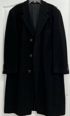 Ralph Lauren trench coat wool black size 42 SH short. Nice coat in good preowned condition One thing to notice near first button hole small wool wear see photo Size 42 short Length 48” Armpit to armpit 24” across 3 exterior pockets 3 interior pockets Formal Black Single Breasted Wool Coat, Black Pea Coat With Buttons For Formal Occasions, Formal Black Outerwear With Buttons, Classic Black Wool Coat For Business, Black Wool Coat With Button Closure For Formal Occasions, Formal Black Wool Coat With Buttons, Tailored Black Pea Coat For Business, Black Wool Coat For Business, Black Fitted Long Pea Coat