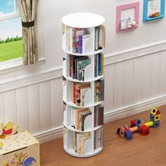 there is a book shelf in the room with toys on the floor next to it