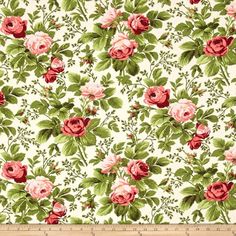 a white background with pink roses and green leaves on the bottom right corner is a ruler