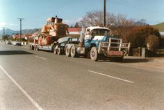 a large truck is parked on the side of the road