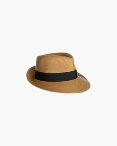 A classic fedora of Squishee® straw, banded in grosgrain ribbon finishing to the side with a tailored bow. Elasticized inner band fits most. Lightweight and packable. Blocks 95% UVA/UVB rays. Independent testing in accordance with AATCC (American Association of Textile Chemists and Colorists) test methods have determined this product’s effectiveness for blocking ultraviolet radiation as well as UVA/UVB radiation. This product was awarded the highest rating of 50+ UPF by independent testing. To l Small Leather Accessories, Austrian Empire, Fedora Hat Men, Fedora Hat Women, Straw Beach Bag, Gold Sand, Designer Hats, Navy Linen, Women's Headwear