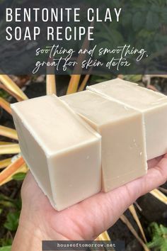 someone holding three soap bars in their hand with the text, how to make homemade bentonite clay soap recipe