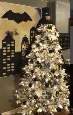 the batman christmas tree is decorated with black and white ornaments