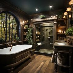 a bath room with a tub a sink and some lights on the ceiling in front of large windows