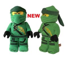 two green ninjas are posed next to each other