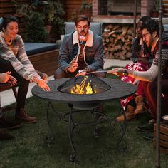 Add warmth to your patio, deck or backyard with this versatile wood burning fire pit table! This round fire pit is ideal for cool nights out on your patio with family or friends, which also can serve as a practical dining table for your indoor activity. Made of heavy duty steel frame with heat-resistant finish, our fire pit table features ex cellent sturdiness and durability. Thanks to its waterproof and rustproof design, you can use it for long-lasting outdoor use in confidence. Plus, the deep Solo Stove Fire Pit Table Backyard, Dinning Table Top Fire Pit, Outdoor Fireplace Tables, Gas Fire Pit Table Deck, Gas Fire Pit Seating, Propane Fire Pit Table Patio Decks, Fire Pit Bar Table, Table Top Fire Pit Wood, Propane Tank Fire Pit Table